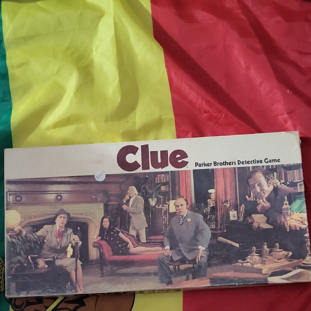 Clue Detective Board Game - Classic Red and Yellow